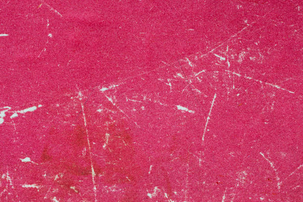 istock Aged red paper texture, grunge vintage background, dirt surface with spots, scratches 1463779391