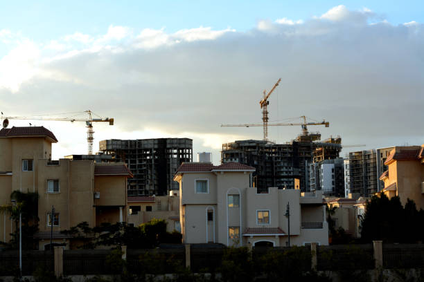 Giza, Egypt, February 4 2023: A construction site of new high rise in Egypt by Orascom construction Zed city Sheikh Zayed, new real estate Egyptian projects and new residential towers, selective focus