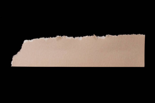 istock Torn paper piece isolated on black background 1463795817