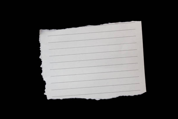 istock Torn paper piece isolated on black background 1463795879