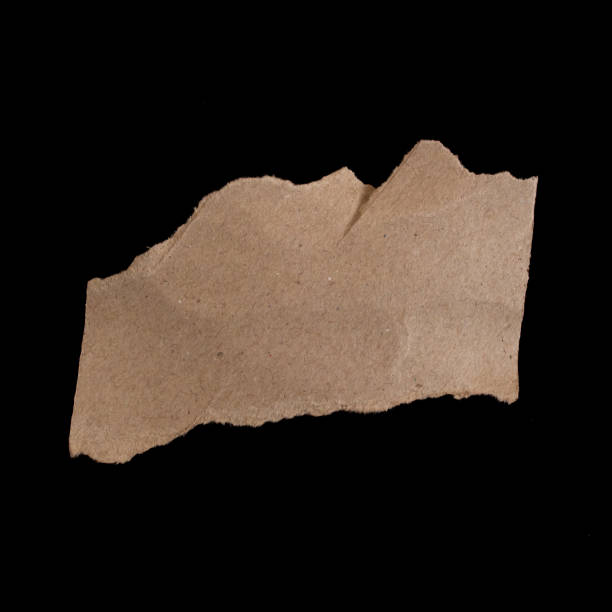 istock Torn paper piece isolated on black background 1463796623