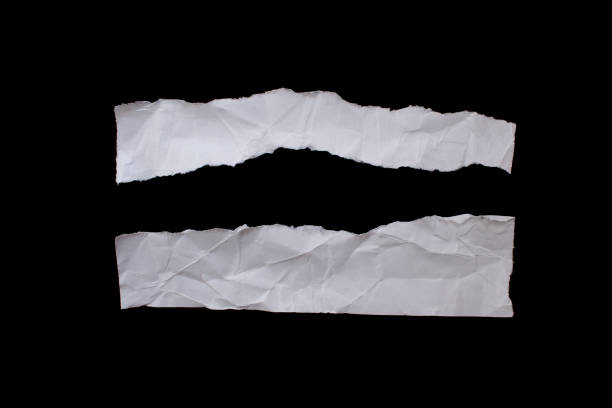 istock Crumpled torn paper on black background 1463798081