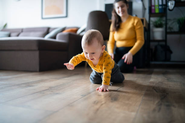 istock Mother taking care of her son at home. 1463799231