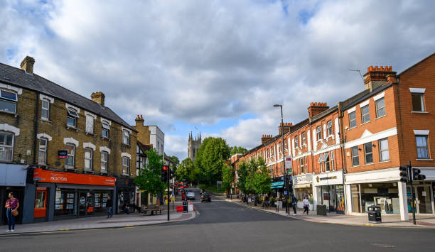 Beckenham (Greater London), Kent, UK. Beckenham High Street at Thornton's Corner. Looking north along the High Street towards St George's Church.
