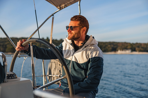 Good Looking Sailor Smiling And Wearing Sunglasses Stock Photo