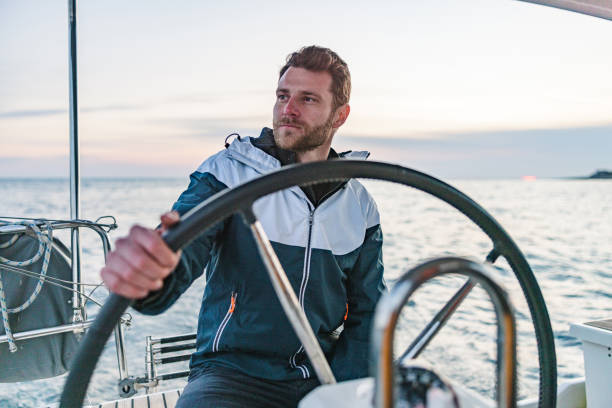 istock Caucasian Good Looking Sailor Smiling And Looking At The Horizon 1463800873