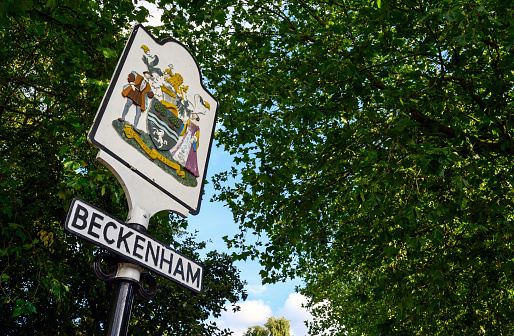 Beckenham (Greater London), Kent, UK. Historical old town sign on Beckenham Green with a backdrop of trees. Near the High Street in Beckenham.