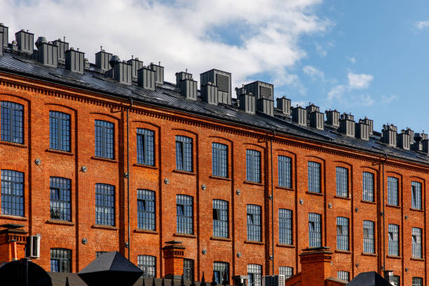 istock Modern brick and glass facade of the office building. 1463804411