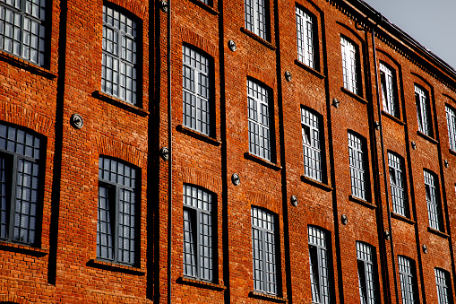 Red brick facade of the factory