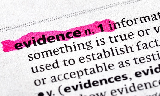 close up photo of the word evidence