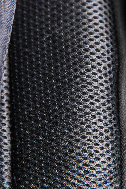 istock Detail ,design, black, light, gray, canvas, circle pattern,close up, grid, industrial, macro, automobile, industry, carbon fiber, fibre, carbon, detail, geometric, fabric, fiber, textile, spotlight, abstract, creative, monochrome, material, structure, bla 1463805095