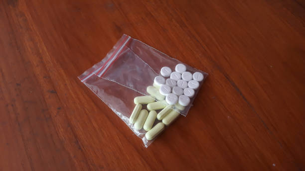 istock Ilegal drugs packet in plastic 1463805322
