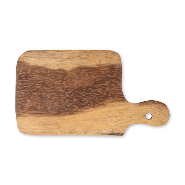 istock Handmade wooden cutting board isolated over white background 1463807891