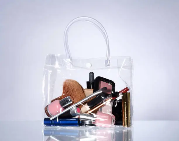 Transparent bag with cosmetic beauti products