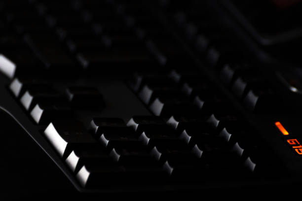 Illuminated gamer keyboard detail, selective focus, concepts, close up