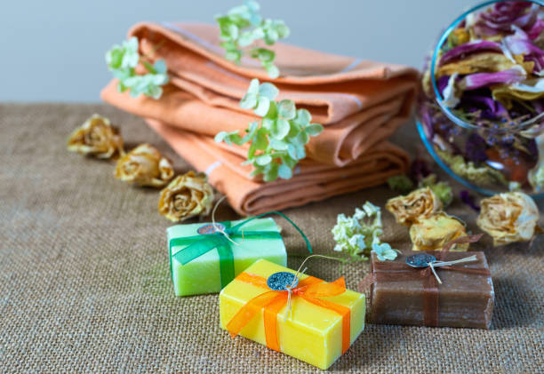 Concept of spa with natural organic handmade soap. Moisturizing skin care and aromatherapy. Gentle body treatment.