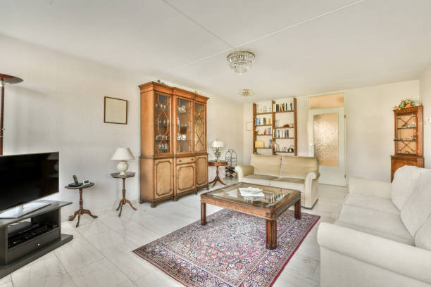 istock Living room with bookshelves and sofa 1463810800