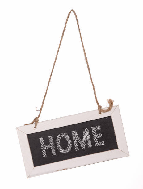 istock Wooden framed blackboard with chalk hanging at an angle 1463813151