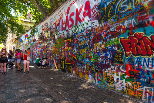 Prague, Czech Republic - June 25,2016: The Lennon Wall or John Lennon Wall is a wall in Prague, Czech Republic.