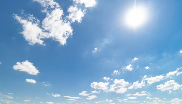 istock Panoramic view of clear blue sky and clouds, Blue sky background with tiny clouds. White fluffy clouds in the blue sky. 1463816899