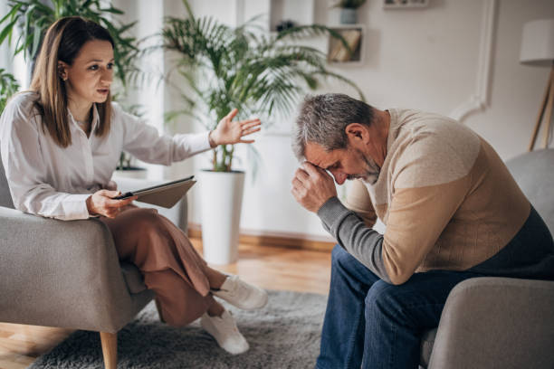 istock Psychotherapy, an elderly man at a psychiatrist 1463817907