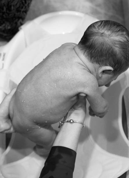 istock Baby on the shower 1463819905