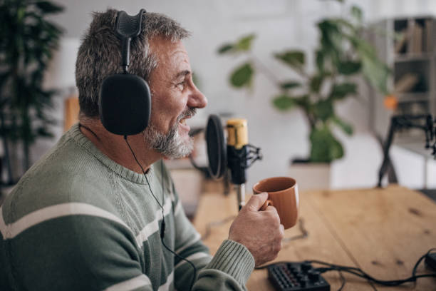 istock Senior is recording a podcast 1463820042