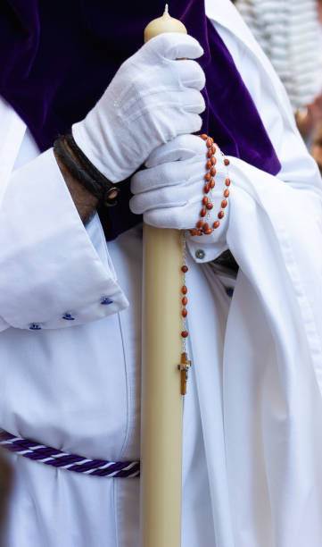istock Nazarene carrying a rosary in the Holy Week procession. 1463821803