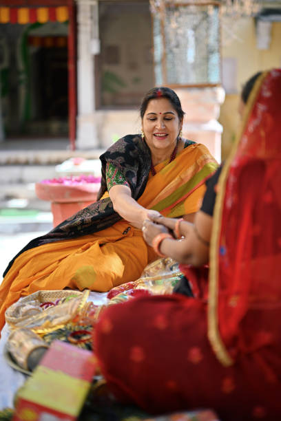 istock Senior woman buying bangles from a local bangle Vendor 1463822348