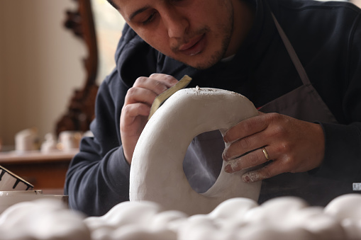 Ceramic artist makes sculpture