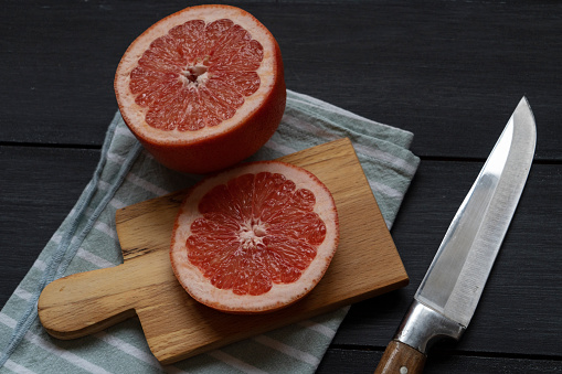 Grapefruit on wood background