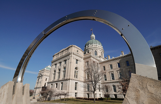 Indianapolis - Circa January 2023: Indiana State House framed by Dale Enochs' \