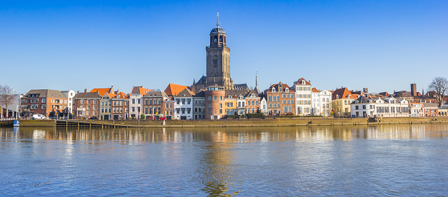 The Hague tower and old  houses at  beautiful pond Hofvijver, The Hague (Den Haag), The Netherlands.