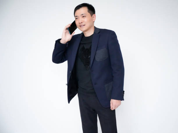 istock Portrait of businessman, white collar, office worker using mobile phone 1463827526