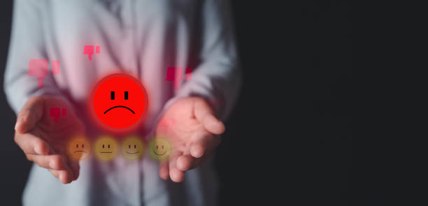 istock hand give unhappy face for feedback review satisfaction service, Customer service experience and business satisfaction survey. 1463827713