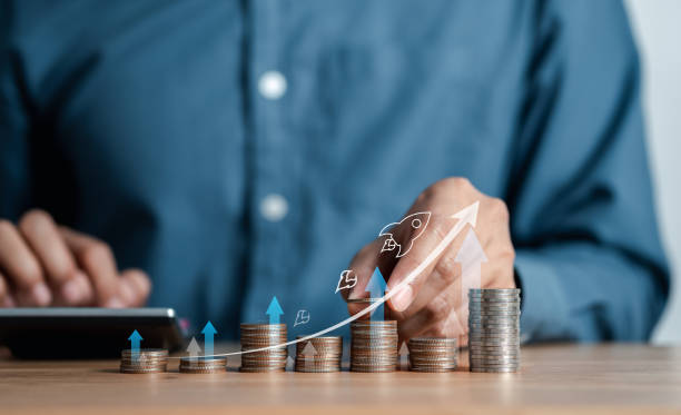istock Growth arrows increase planning business target chart to successful. Businessman touching arrows analyst to leadership objective goal. Corporate strategy for finance, operations, sales, marketing. 1463828992