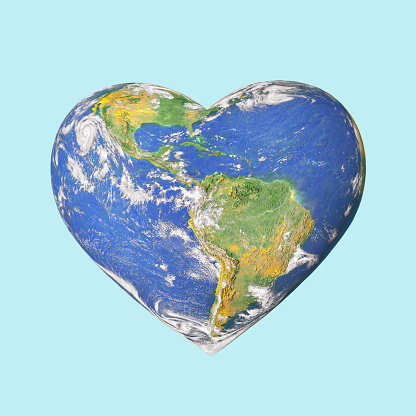 Heart shaped planet Earth on isolated pastel blue background. Minimal creative concept of travel agency or Earth Day greetings card. Environmental idea. The world provided by NASA: https://earthobservatory.nasa.gov/images/565/earth-the-blue-marble