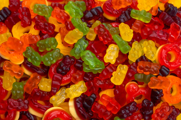 istock Assorted colorful gummy candies. Jelly donuts. Jelly bears. 1463830001