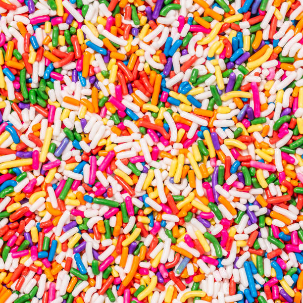 Sprinkles Texture Overhead Flat Lay of Sprinkles Toppings sugar sprinkles stock pictures, royalty-free photos & images