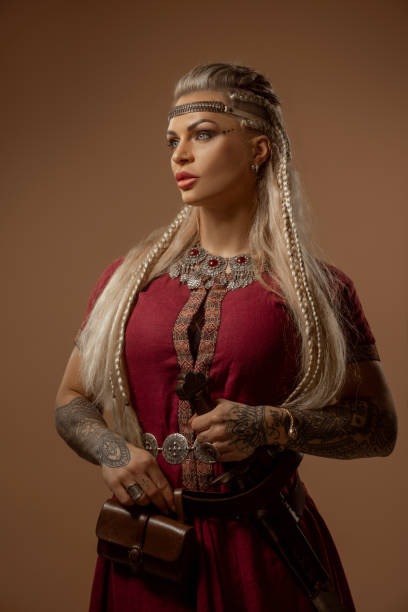 istock Weapon wielding blonde viking warrior queen in studio shot 1463834789