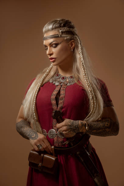 istock Weapon wielding blonde viking warrior queen in studio shot 1463834791
