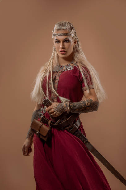 istock Weapon wielding blonde viking warrior queen in studio shot 1463834815