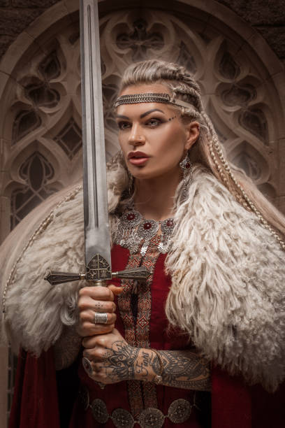 istock Weapon wielding blonde viking warrior queen in studio shot 1463834893