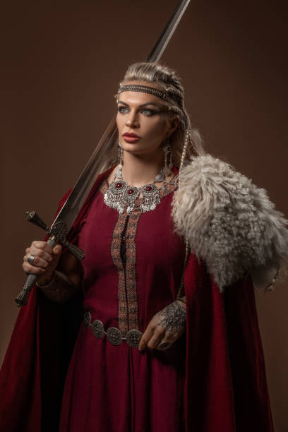 istock Weapon wielding blonde viking warrior queen in studio shot 1463834909