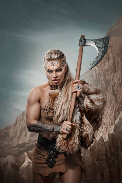 istock Beautiful Blonde Warrior Woman on a mountain side 1463834975