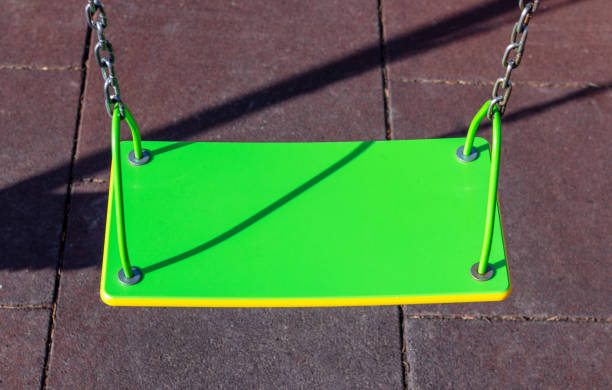kid having fun at playground on slide swing ship shape colorful construction