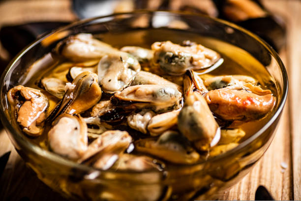 istock Pickled mussels in a glass bowl. 1463842661