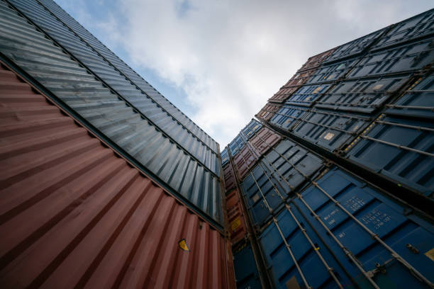 istock Cargo container for overseas shipping on high stack look up from ground . Logistics supply chain management and international goods export concept . 1463843048