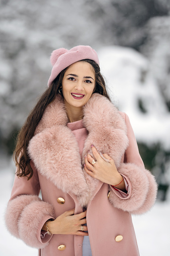 Portrait of beautiful young woman enjoying a nice winter day