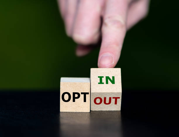 istock Cubes form the expressions 'opt in' and 'opt out'. 1463846431